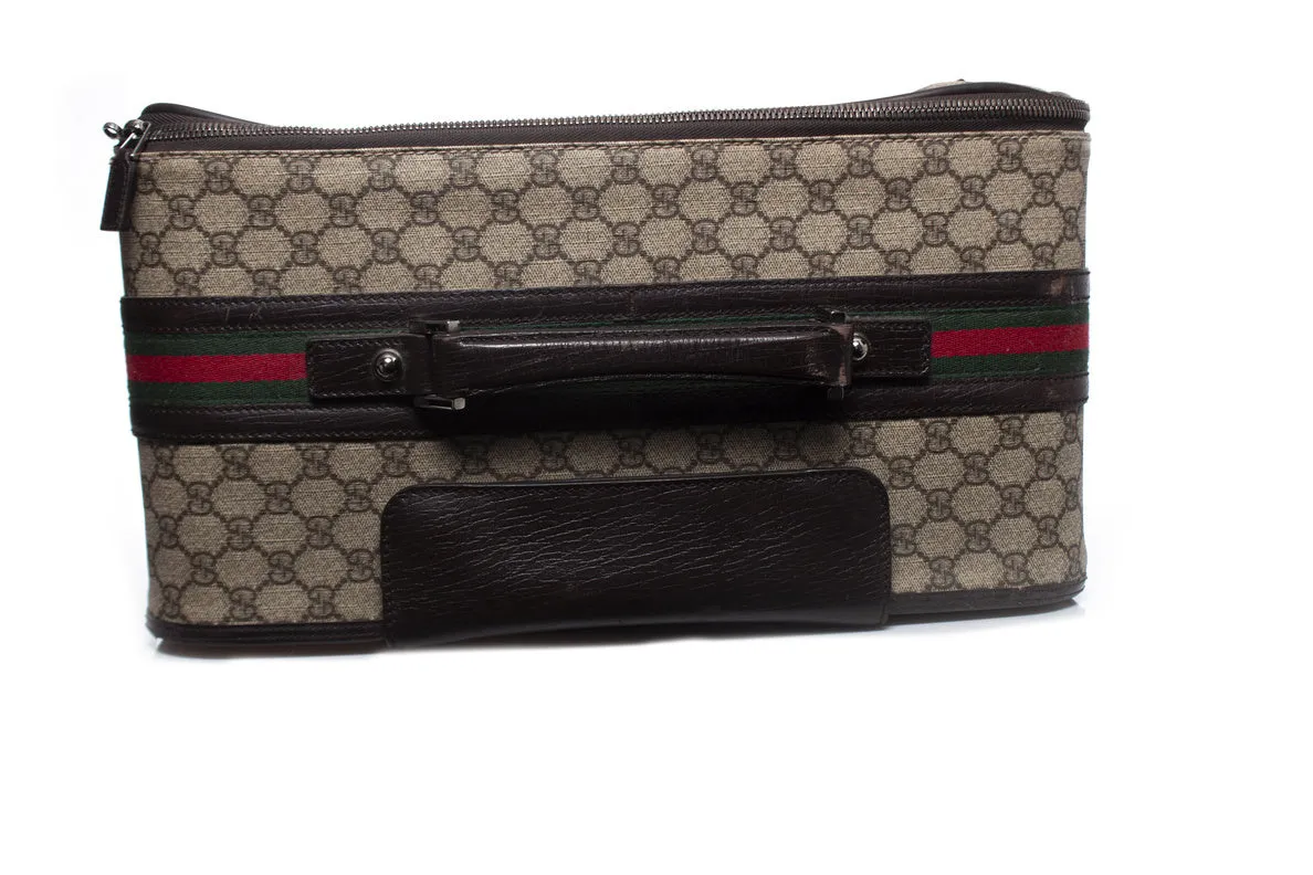 GG canvas suitcase in brown