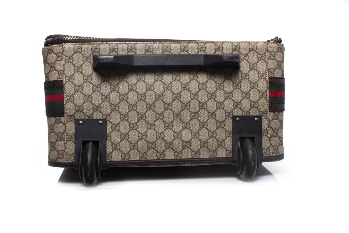 GG canvas suitcase in brown