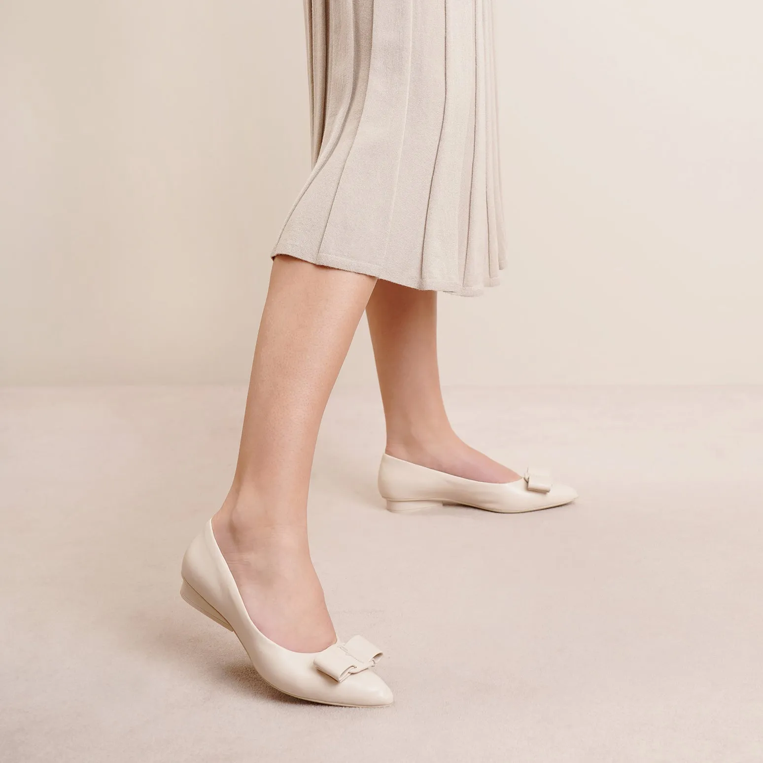 Viva bone flat pumps